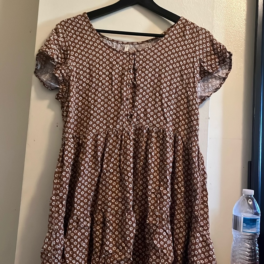 Floral babydoll dress. It fits loosely and looks good with a waist corset.